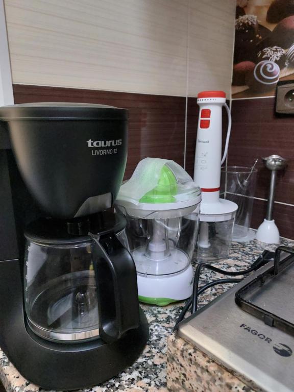 Kuchyň nebo kuchyňský kout v ubytování Appartement confortable neuf