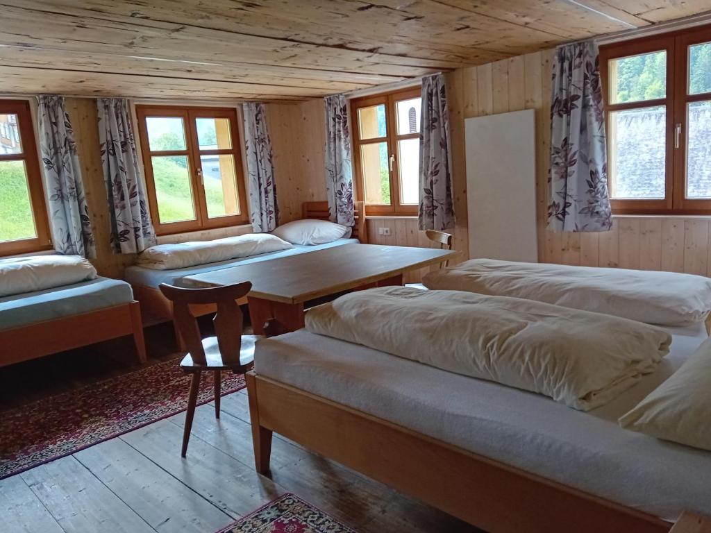 Posteľ alebo postele v izbe v ubytovaní Pfefferhütte