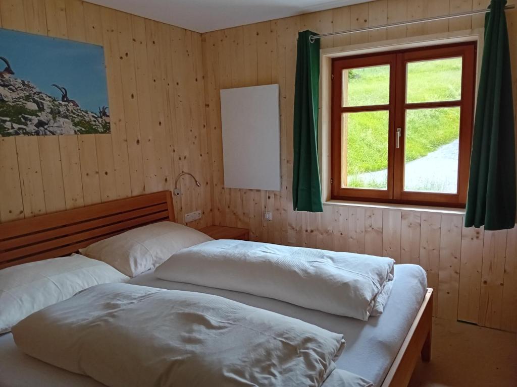 Posteľ alebo postele v izbe v ubytovaní Pfefferhütte