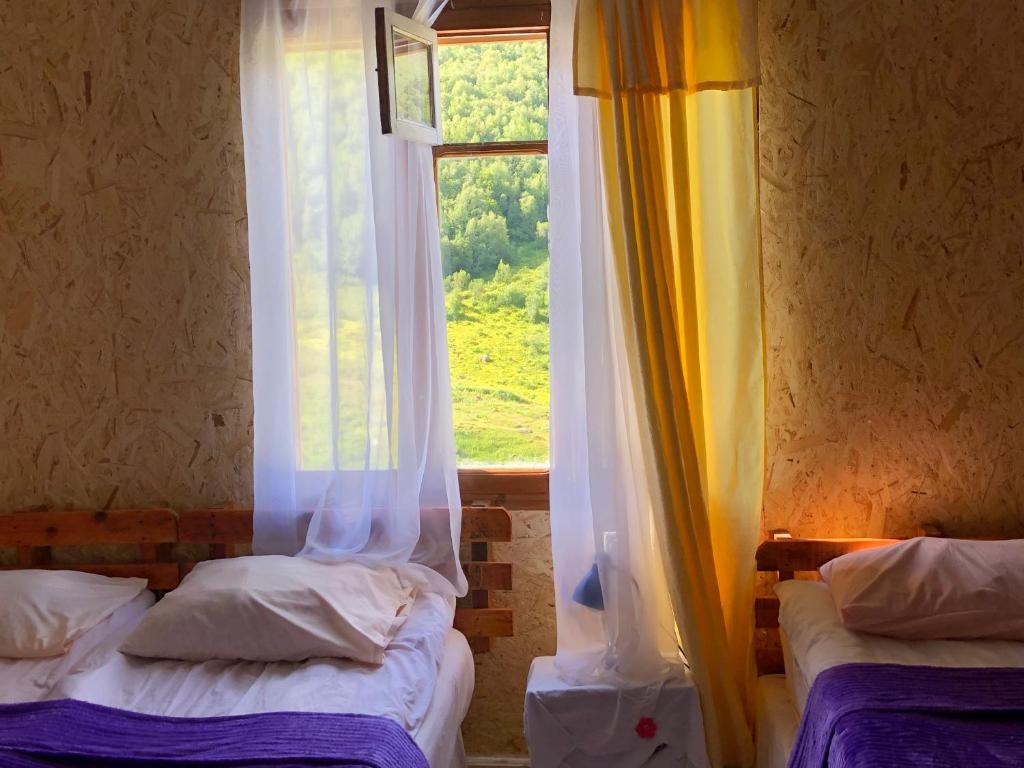 Postel nebo postele na pokoji v ubytování Ela
