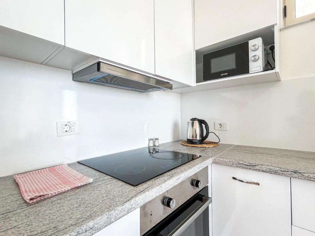 Kuchyň nebo kuchyňský kout v ubytování Oceanfront Oasis 770