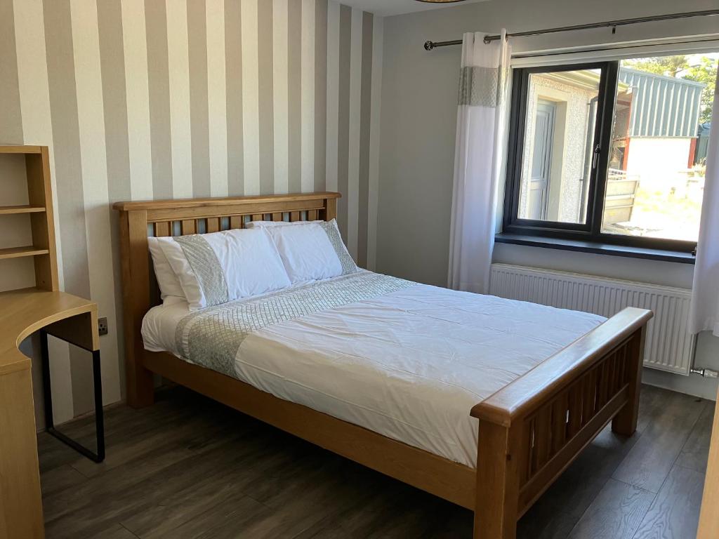 Ένα ή περισσότερα κρεβάτια σε δωμάτιο στο Countryside Rooms