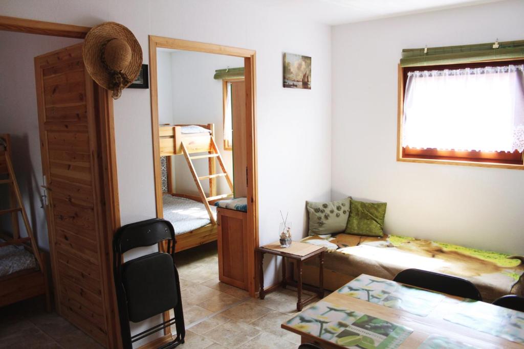 Postel nebo postele na pokoji v ubytování Kwiatu Paproci