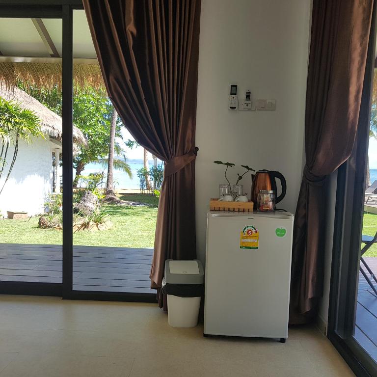 Kuchyň nebo kuchyňský kout v ubytování Sunrise Beach Resort