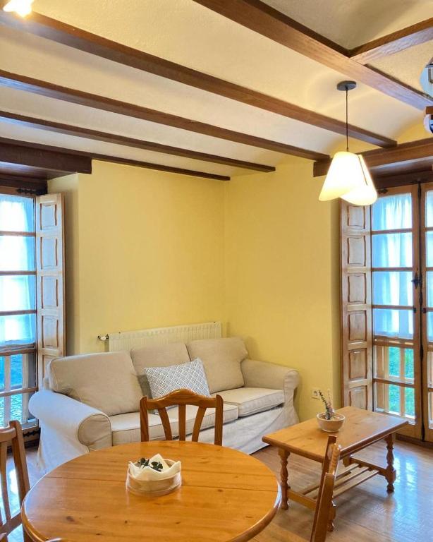 A seating area at Ahío San Martín, Apartamentos Rurales Casa de la Villa