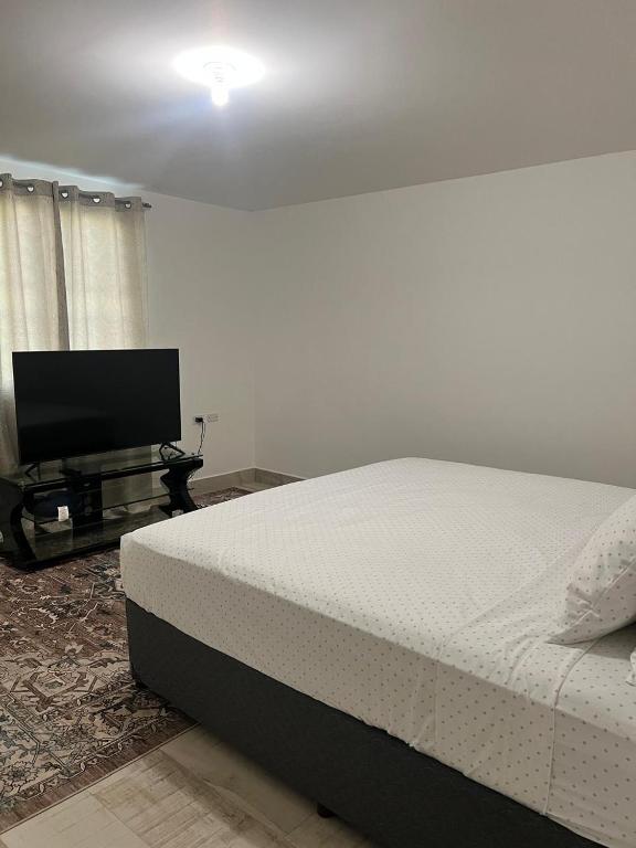 Postel nebo postele na pokoji v ubytování Crusoe Escape Villa