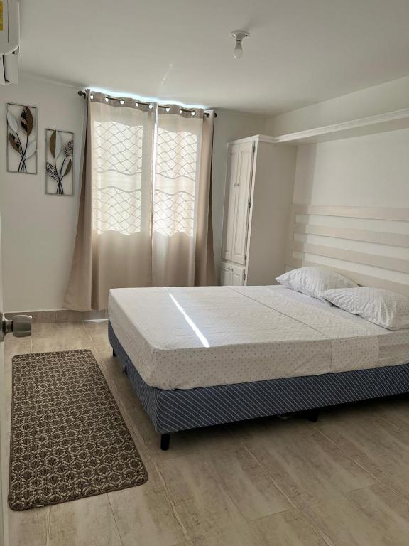 Postel nebo postele na pokoji v ubytování Crusoe Escape Villa