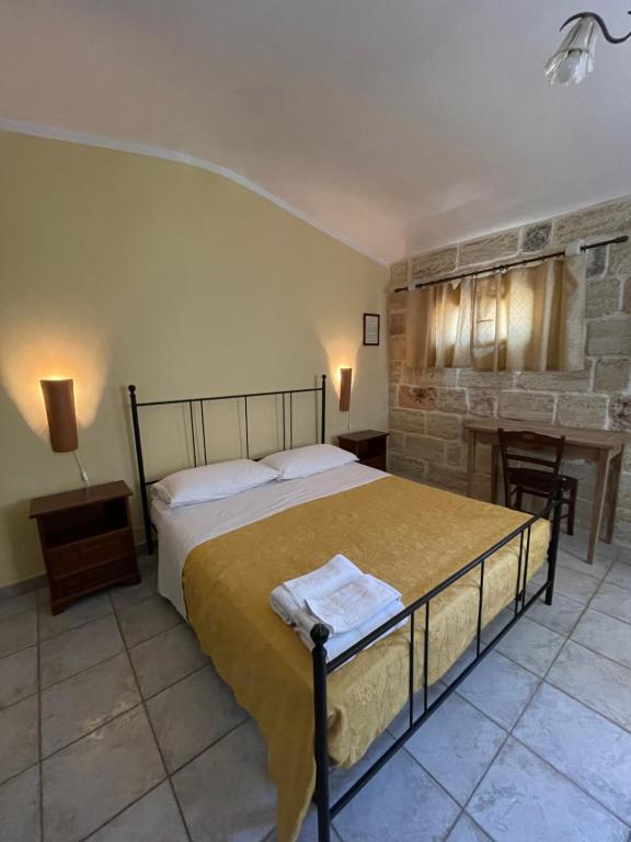 Postel nebo postele na pokoji v ubytování Agriturismo Salento Pietralata