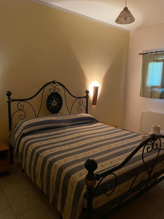 Postel nebo postele na pokoji v ubytování Agriturismo Salento Pietralata