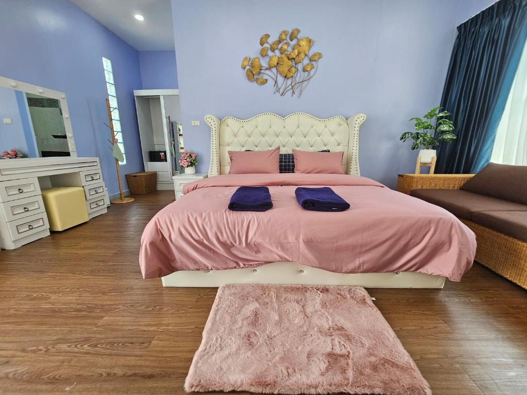 Postel nebo postele na pokoji v ubytování Andaman homestay villa at rawai