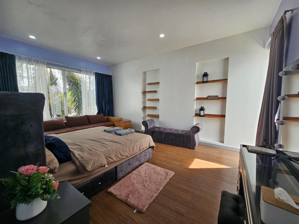 Postel nebo postele na pokoji v ubytování Andaman homestay villa at rawai