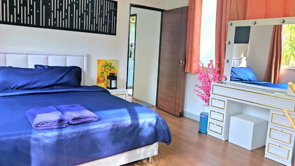 Postel nebo postele na pokoji v ubytování Andaman homestay villa at rawai