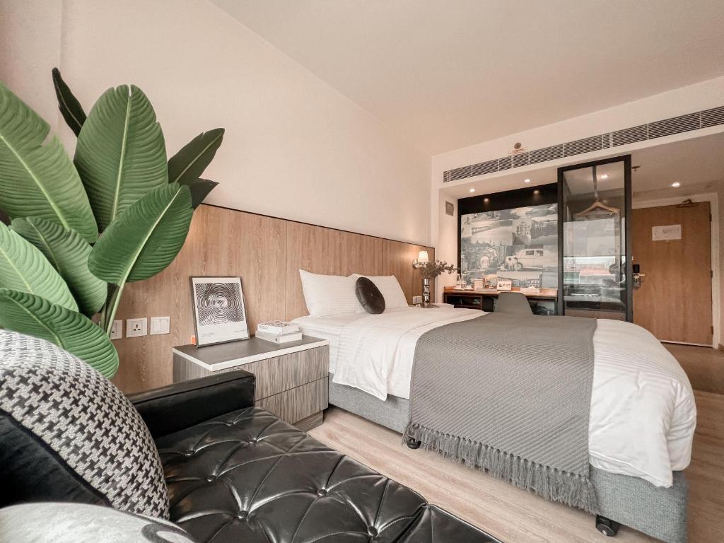 Ένα ή περισσότερα κρεβάτια σε δωμάτιο στο Macau Hotel S - Formerly - Macau Hotel Sun Sun