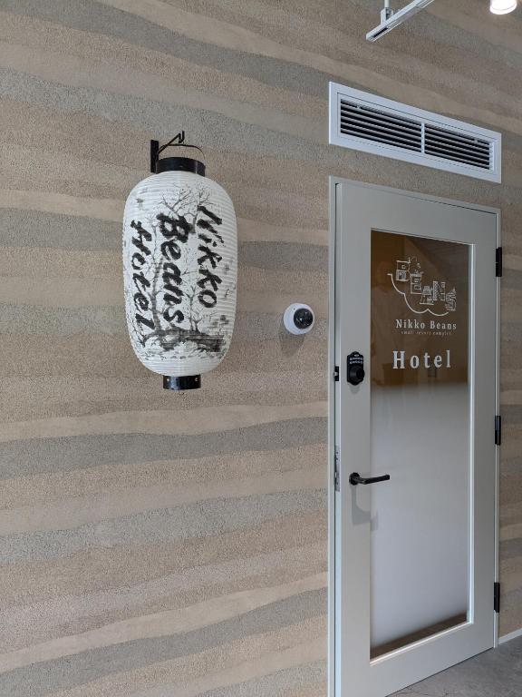 Certifikát, hodnocení, plakát nebo jiný dokument vystavený v ubytování Nikko Beans Hotel