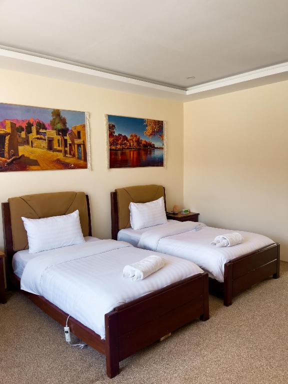 Postel nebo postele na pokoji v ubytování Apex Hotels and Resorts Hussaini