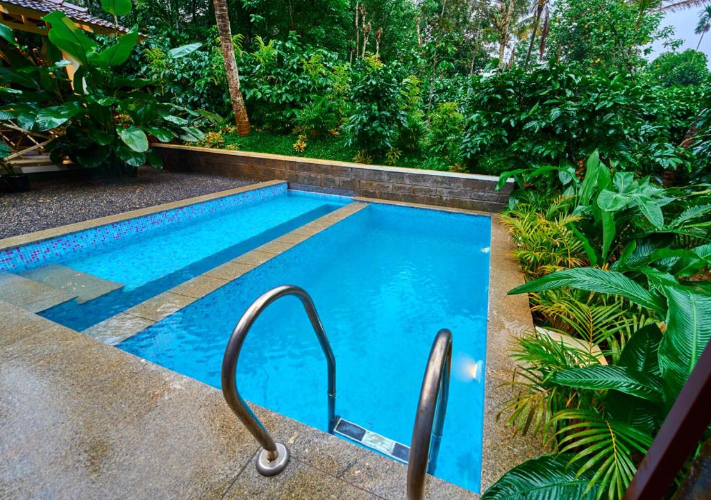 Bazén v ubytování M Cafe Private Pool Villa By VOYE HOMES nebo v jeho okolí
