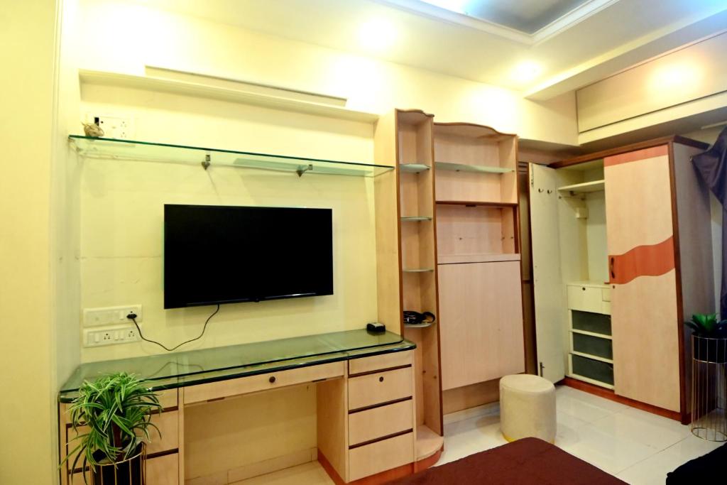 Kuchyň nebo kuchyňský kout v ubytování Cosy studio in SOBO