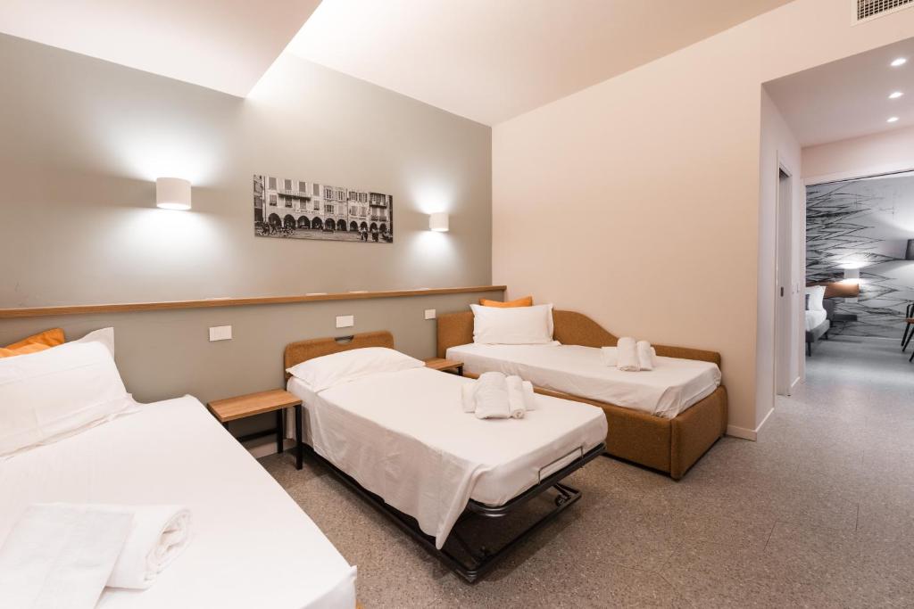 Postel nebo postele na pokoji v ubytování Hotel Stella Del Mare