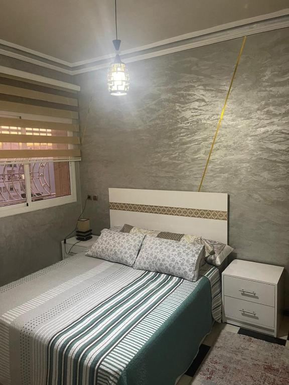 Una cama o camas en una habitación de Apartamento de lujo