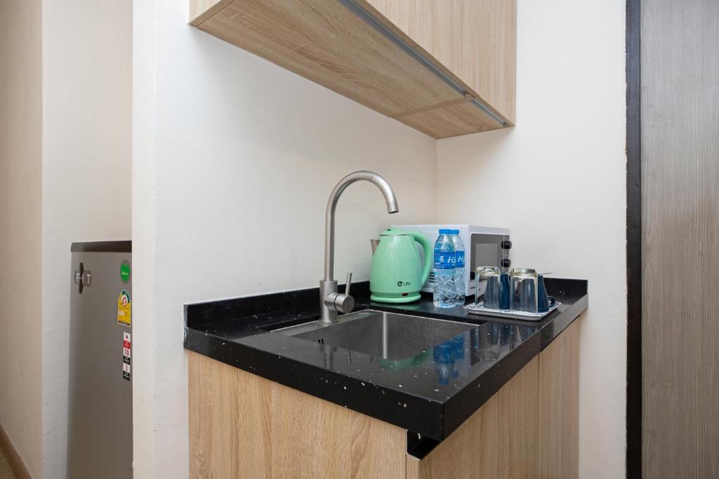 iCheck inn Darisa Patong - Resim 9