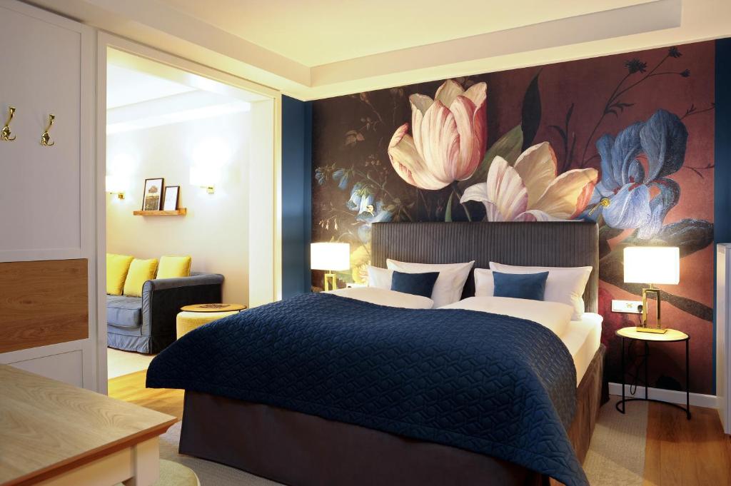 Postel nebo postele na pokoji v ubytování MICHELS Wellness- & Wohlfühlhotel