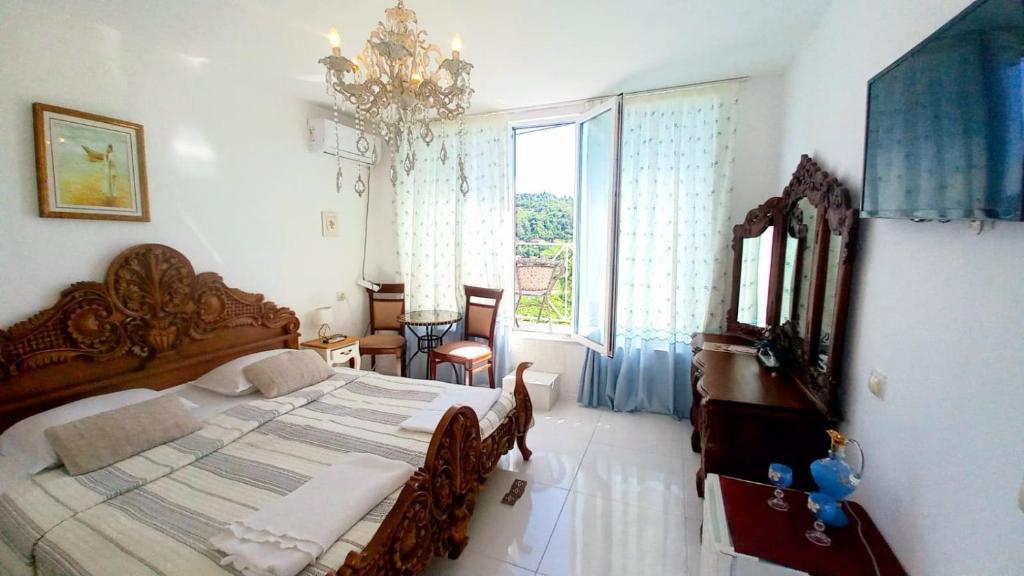 Postel nebo postele na pokoji v ubytování Sighnaghi Art Hotel