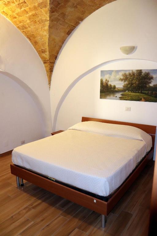 Postel nebo postele na pokoji v ubytování Caval di Posta