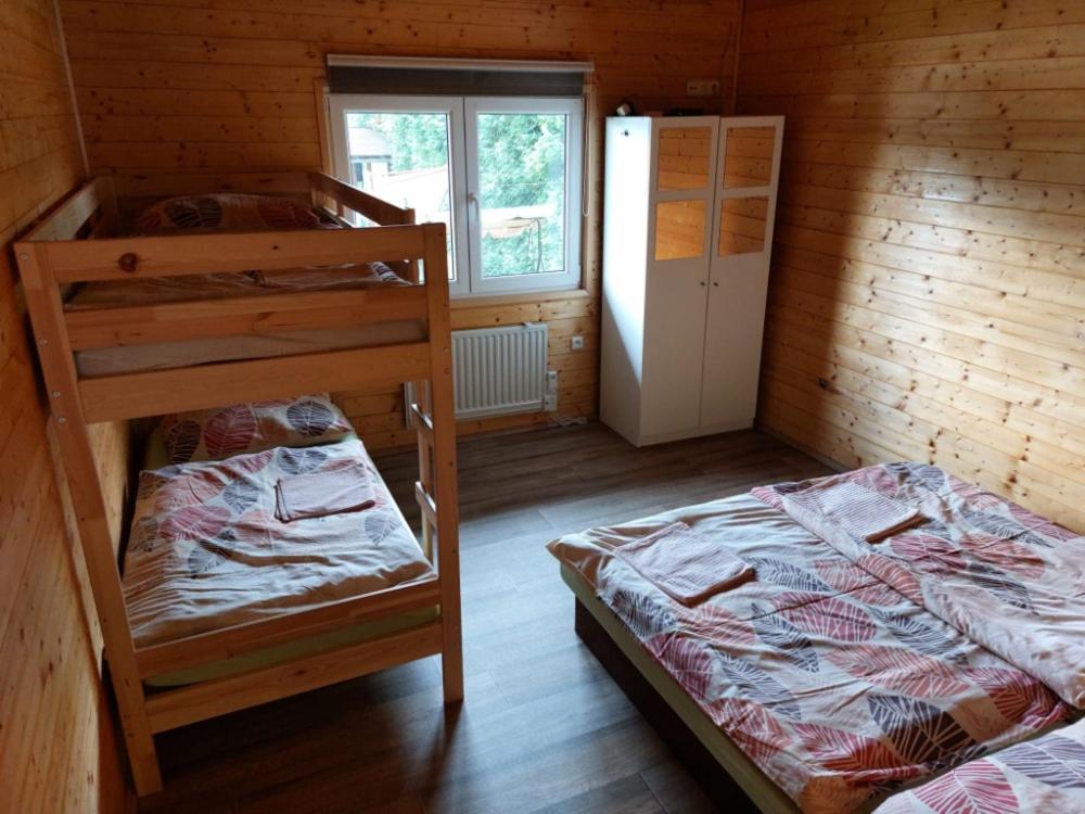 Postel nebo postele na pokoji v ubytování Chata Tereza