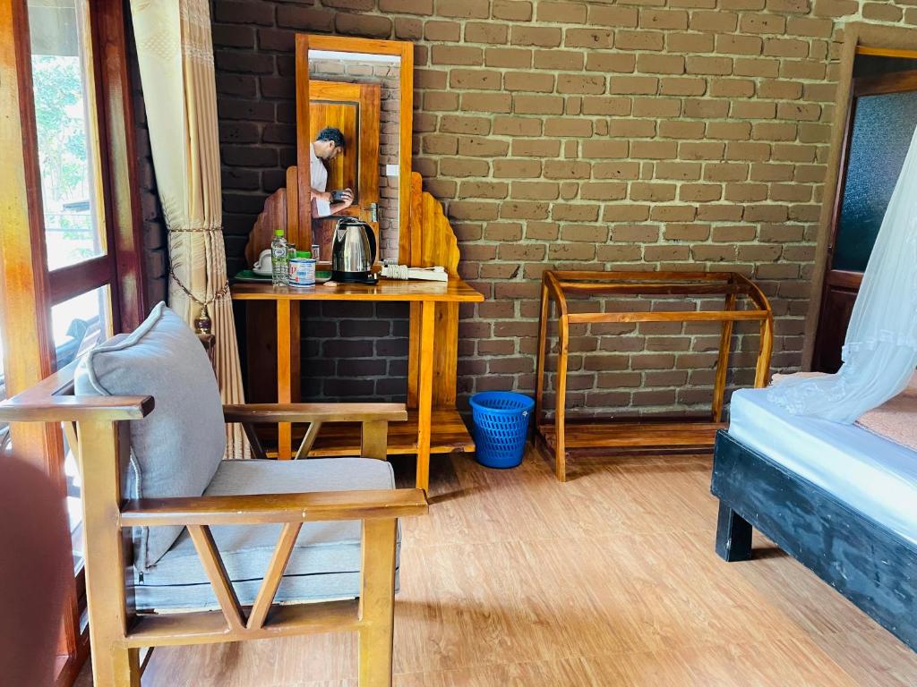 Postel nebo postele na pokoji v ubytování Wild Resort Ella