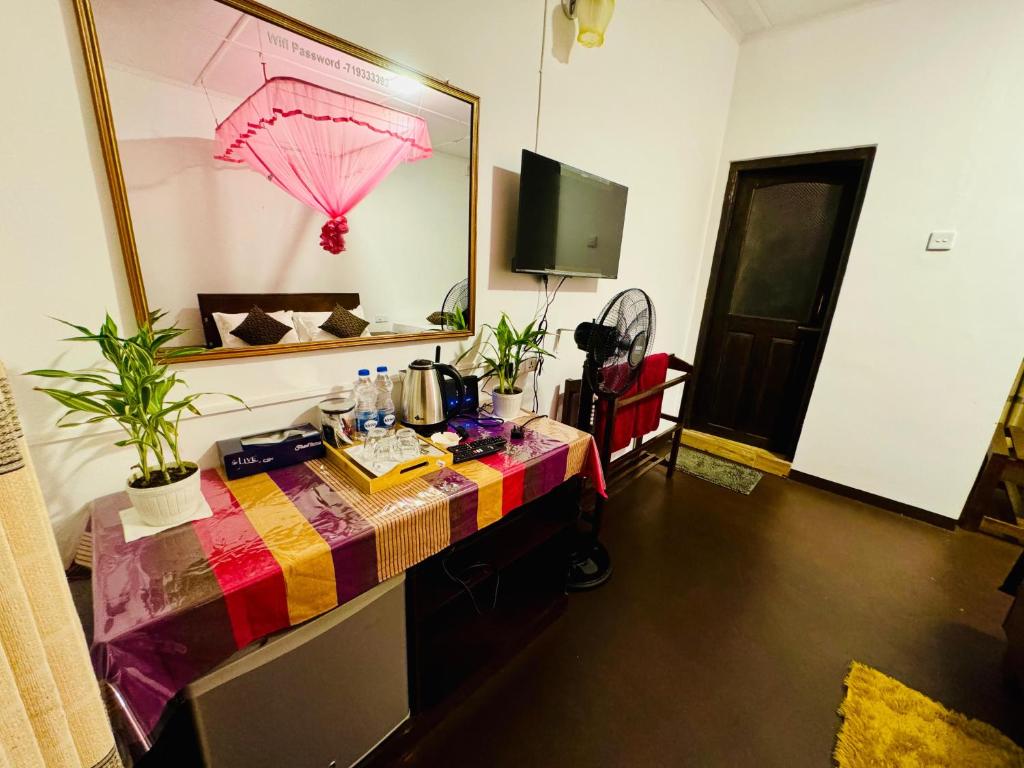 TV a/nebo společenská místnost v ubytování Rock Grand View
