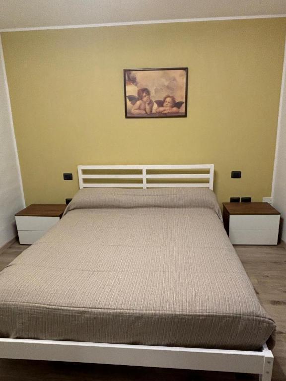 Postel nebo postele na pokoji v ubytování Agriturismo B&B La Cerasa