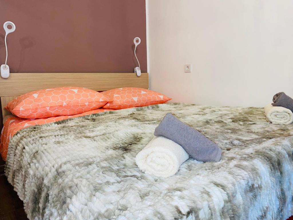 En eller flere senge i et værelse på Apartman Belveder near centar