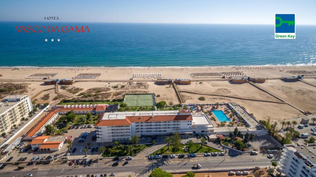 an aerial view of a resort and the beach at Hotel Vasco Da Gama in Monte Gordo