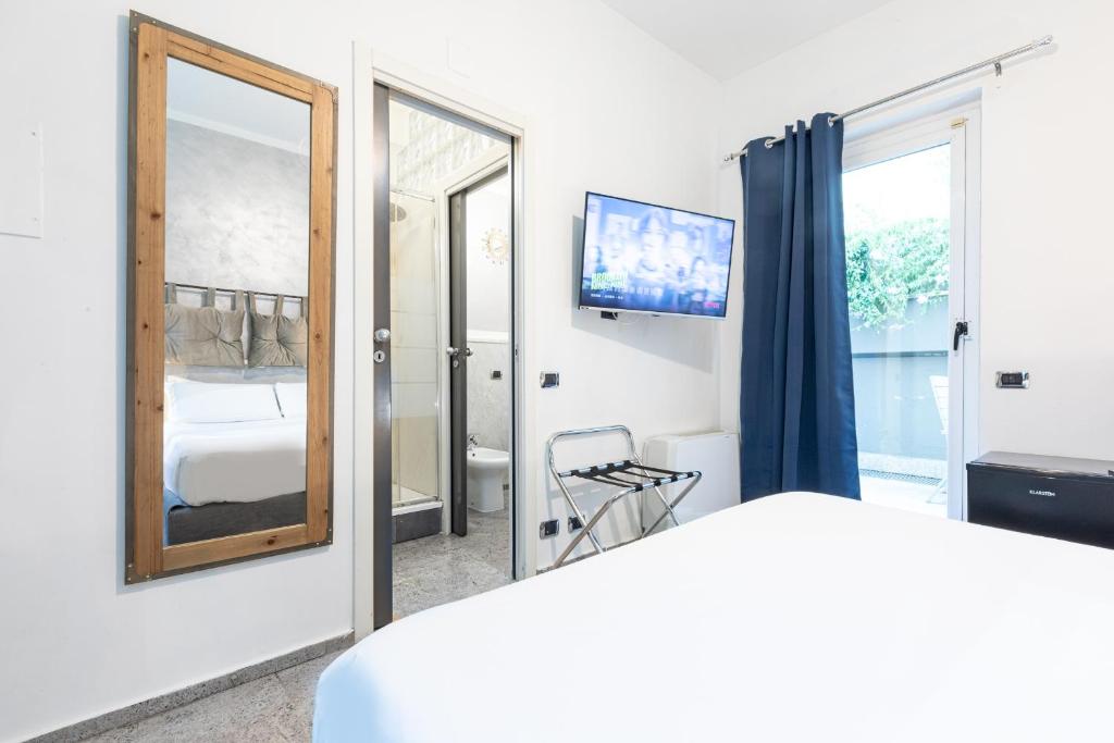 Postel nebo postele na pokoji v ubytování Città Studi Suites - Top Collection