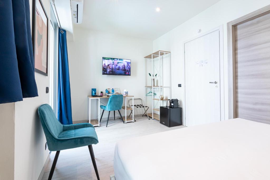 TV a/nebo společenská místnost v ubytování Città Studi Suites - Top Collection