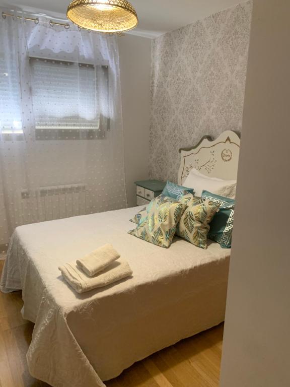 Postel nebo postele na pokoji v ubytování lico
