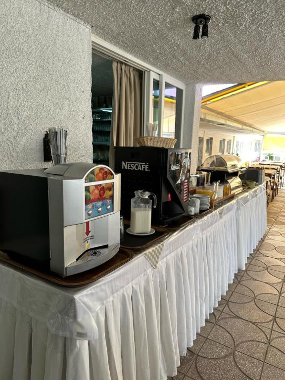 Příslušenství pro přípravu čaje a kávy v ubytování Hotel Olympion