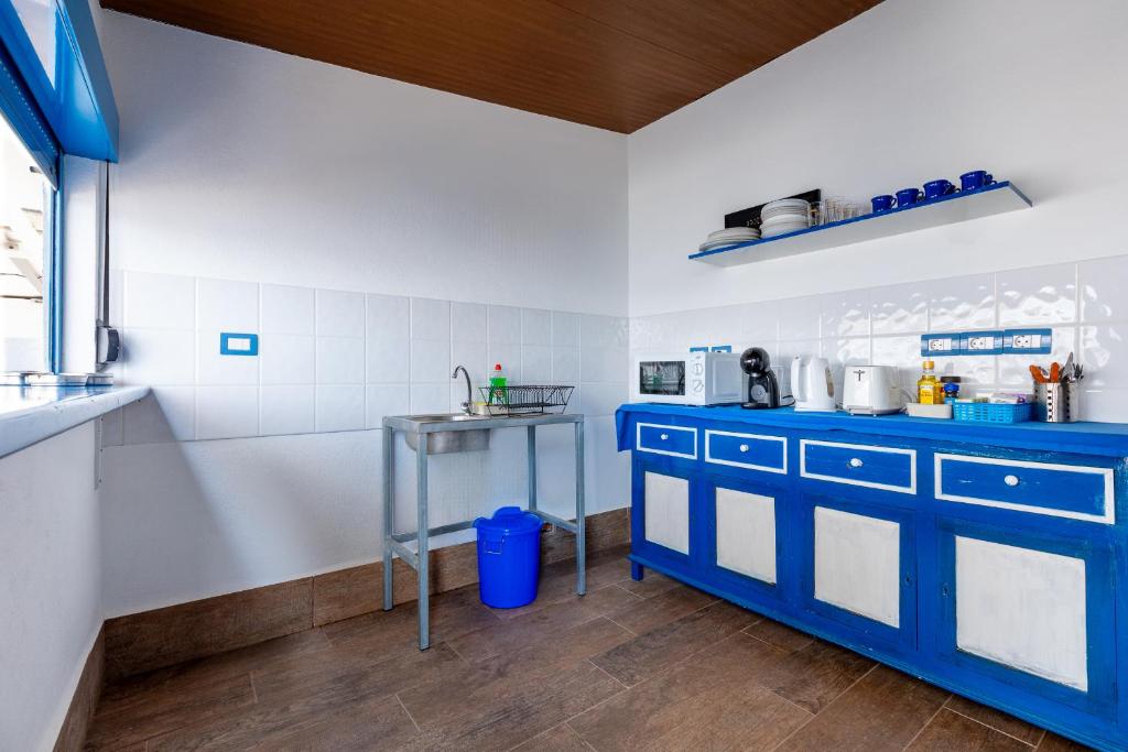 Kuchyň nebo kuchyňský kout v ubytování Riva Eco Guest House