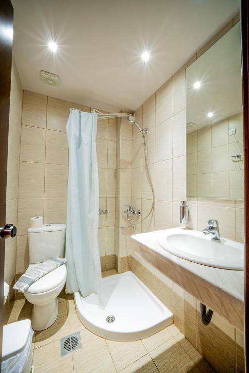 Koupelna v ubytování Hotel Olympion