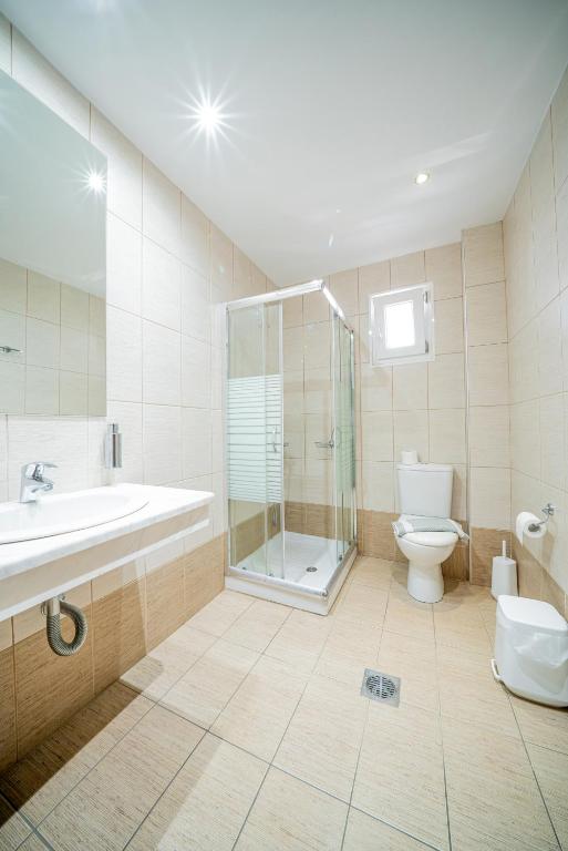 Koupelna v ubytování Hotel Olympion