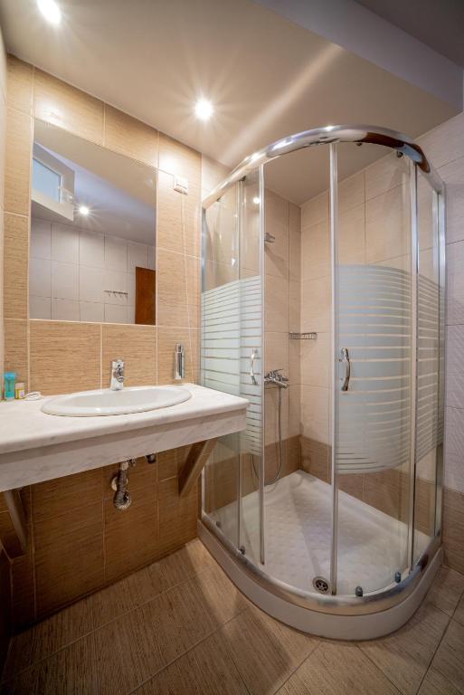 Koupelna v ubytování Hotel Olympion