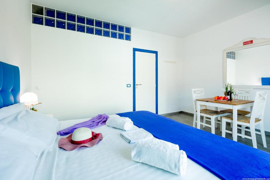 Postel nebo postele na pokoji v ubytování Riva Eco Guest House