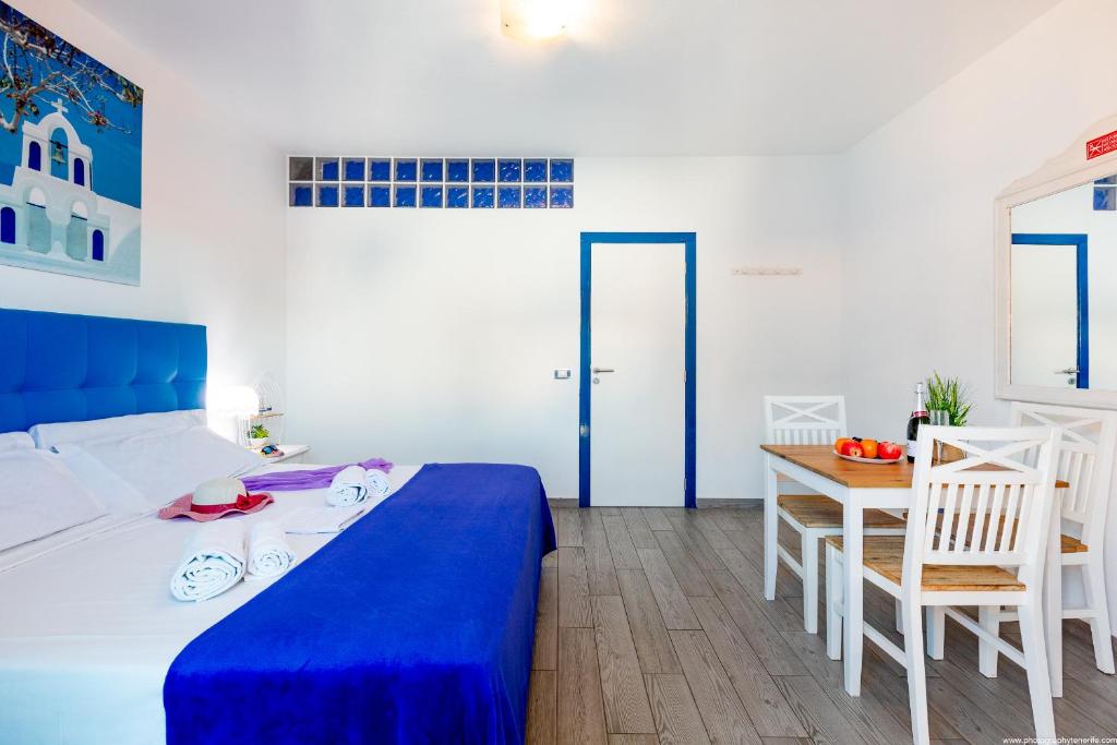 Postel nebo postele na pokoji v ubytování Riva Eco Guest House