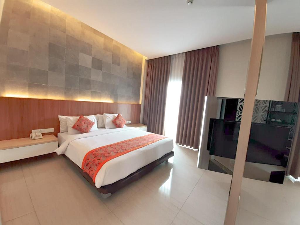 Postel nebo postele na pokoji v ubytování Moscato Hotel