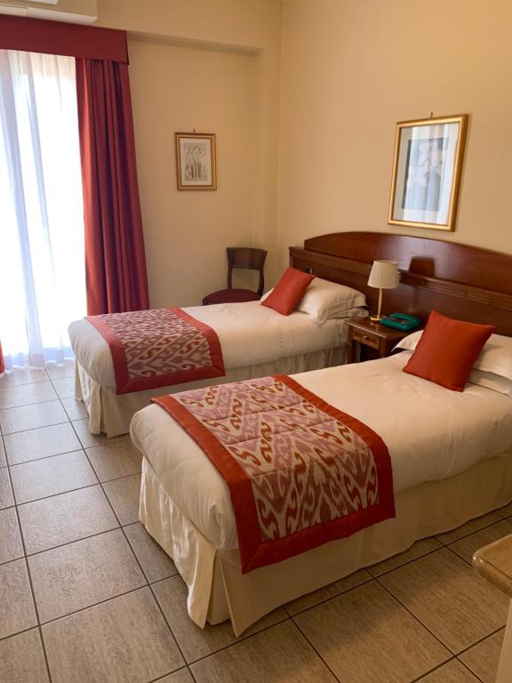 Postel nebo postele na pokoji v ubytování Marini Park Hotel