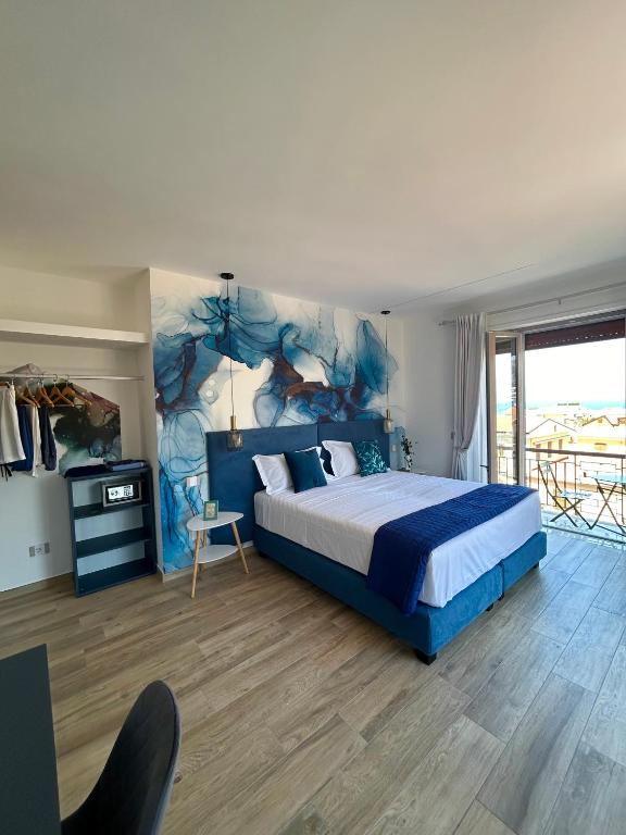 Postel nebo postele na pokoji v ubytování LuMar Luxury Sorrento