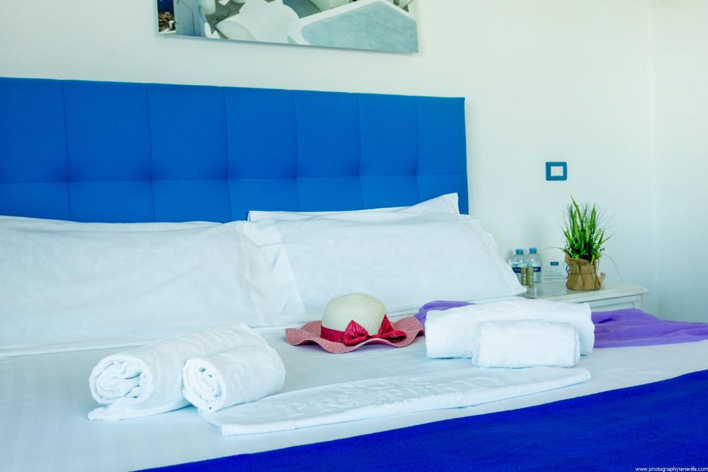 Postel nebo postele na pokoji v ubytování Riva Eco Guest House