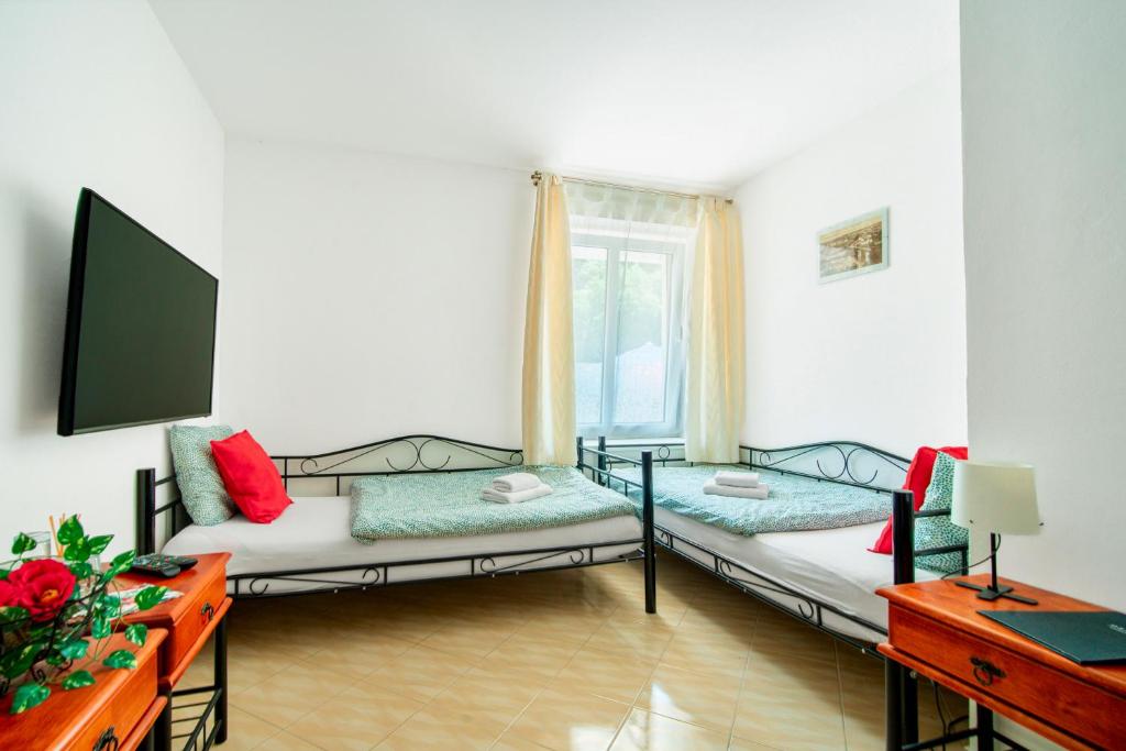 Postel nebo postele na pokoji v ubytování Hotel Ostende