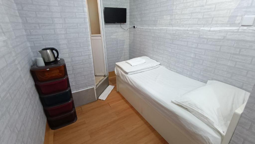 Postel nebo postele na pokoji v ubytování Cozy Inn Jordan Station