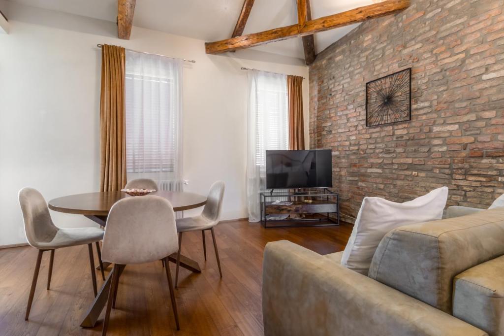 TV a/nebo společenská místnost v ubytování DUOMO Murano Apartment with Canal view